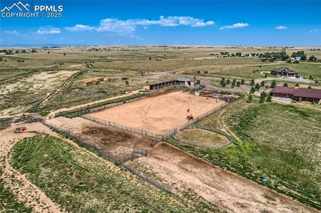 birds eye view of property featuring a rural view