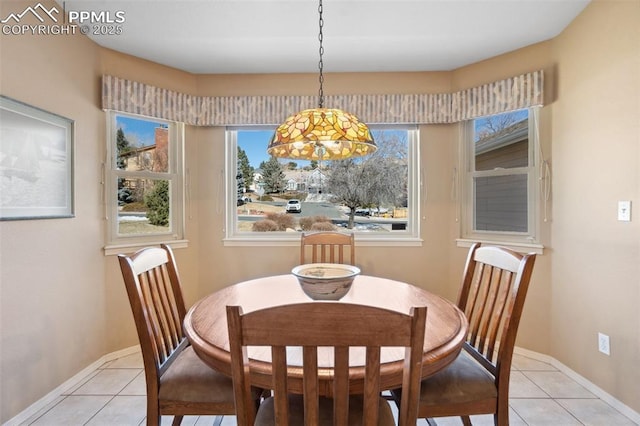 view of tiled dining space