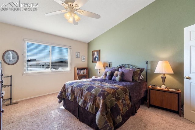 carpeted bedroom featuring lofted ceiling and ceiling fan