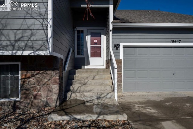 entrance to property with a garage