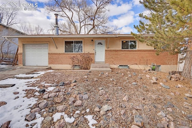 single story home with a garage