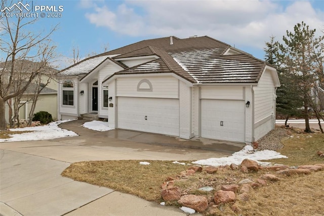 view of front of property featuring a garage