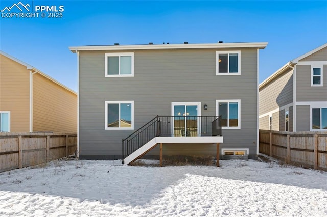 view of snow covered property