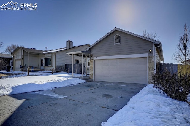 ranch-style home with a garage