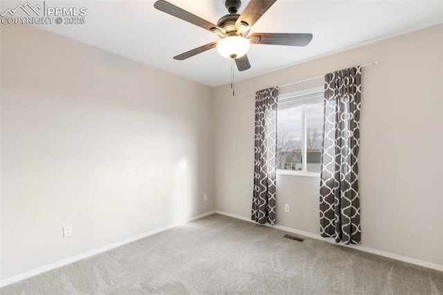 carpeted empty room with ceiling fan