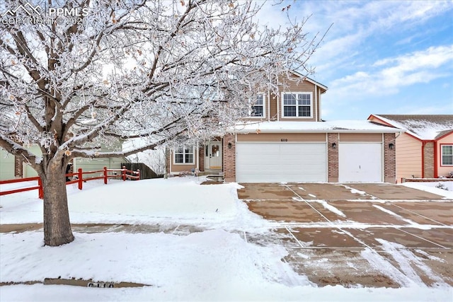 view of front of home with a garage