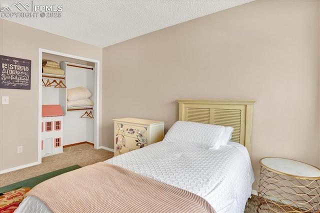 carpeted bedroom with a textured ceiling and a closet