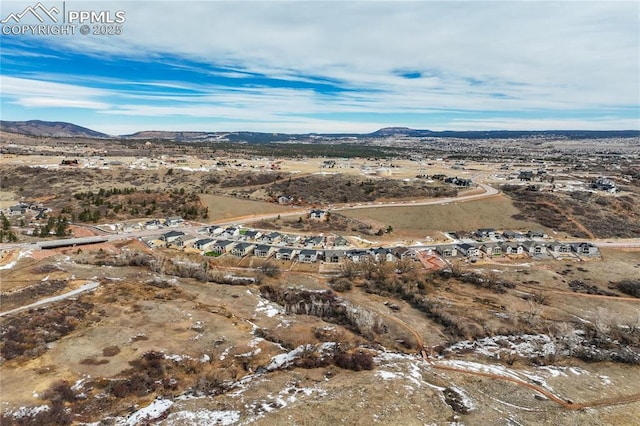 aerial view featuring a mountain view