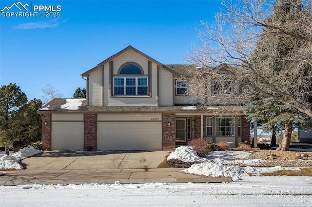 view of front of property with a garage