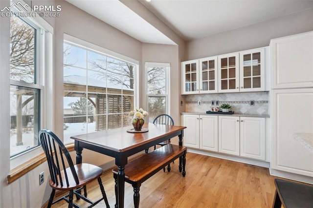 dining space featuring light hardwood / wood-style floors