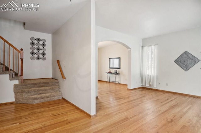 stairway featuring hardwood / wood-style flooring