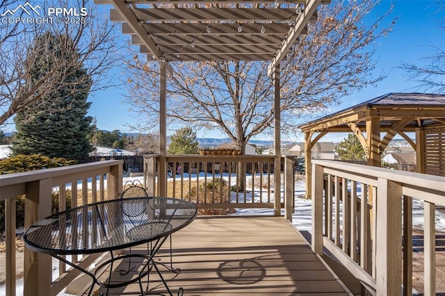 view of snow covered deck