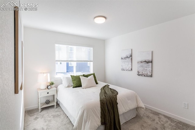 bedroom with light carpet