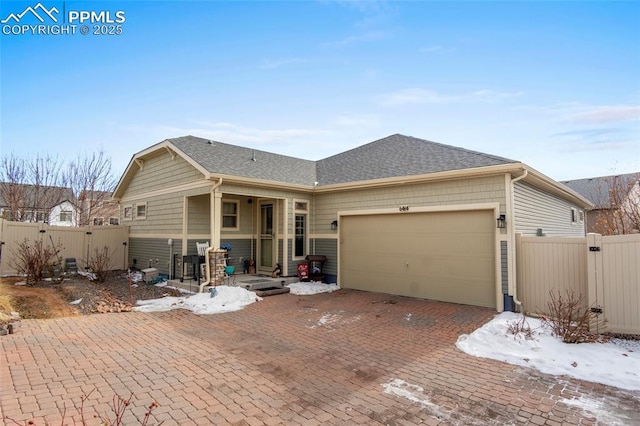 view of front of property with a garage