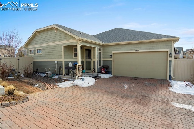 view of front of home with a garage