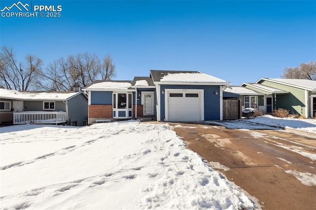 single story home featuring a garage