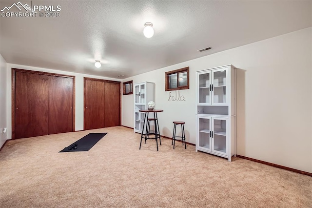 interior space featuring a textured ceiling