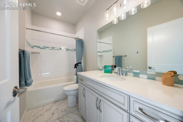 full bathroom featuring vanity, shower / bathtub combination with curtain, and toilet