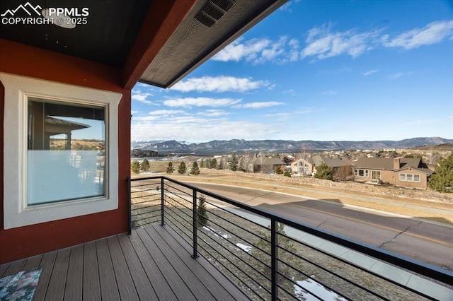 balcony featuring a mountain view