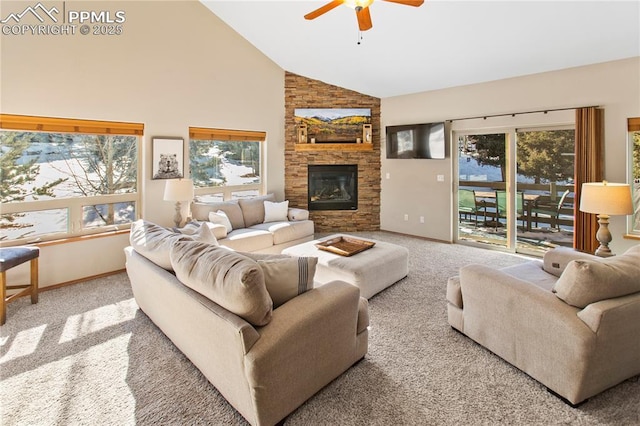 carpeted living room featuring ceiling fan, a fireplace, and high vaulted ceiling