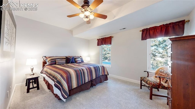 carpeted bedroom featuring ceiling fan