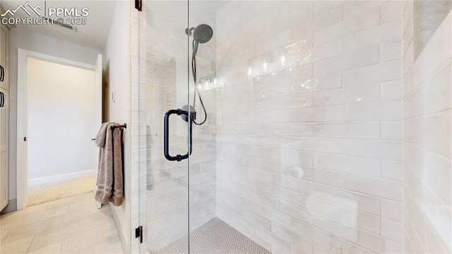 bathroom featuring an enclosed shower