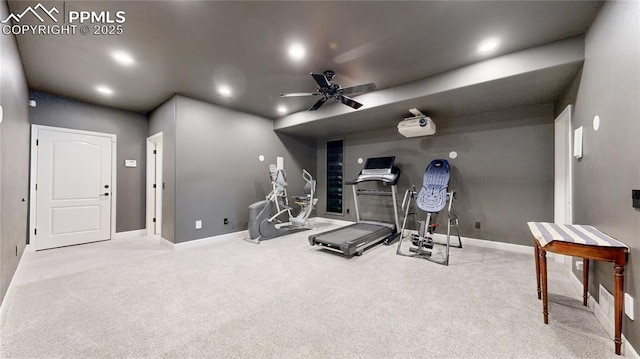 workout area with light carpet and ceiling fan