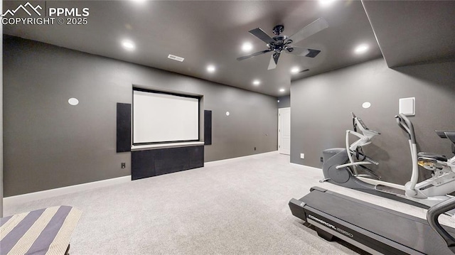 carpeted cinema with ceiling fan