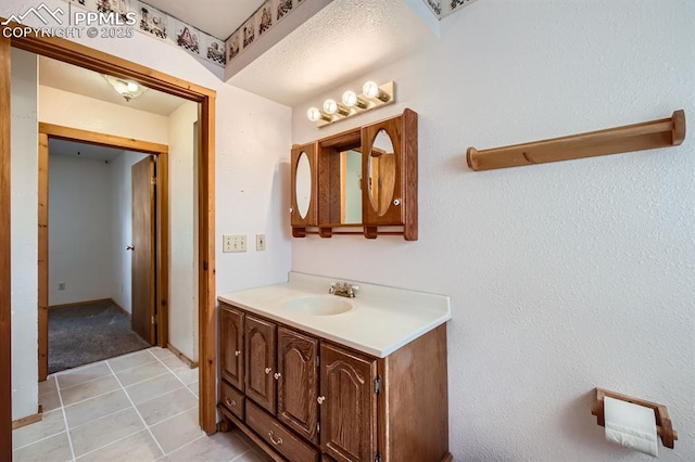 bathroom featuring vanity and tile patterned flooring