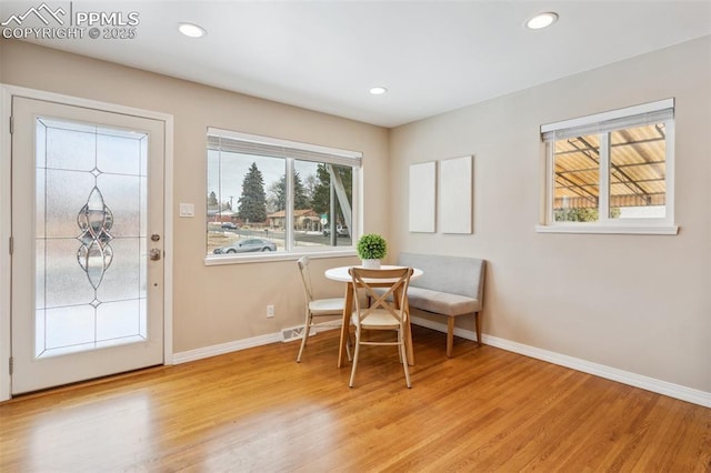 dining room featuring light hardwood / wood-style flooring