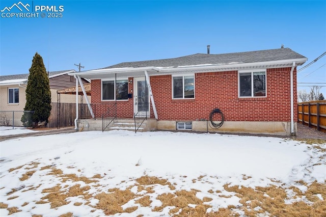 view of snow covered property