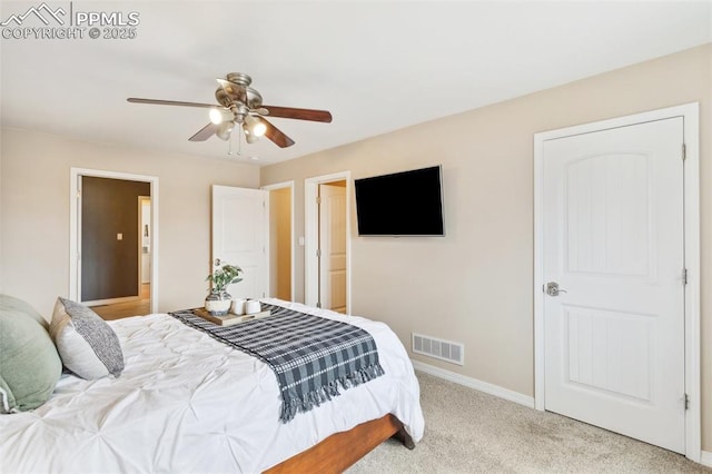 bedroom featuring light colored carpet and ceiling fan