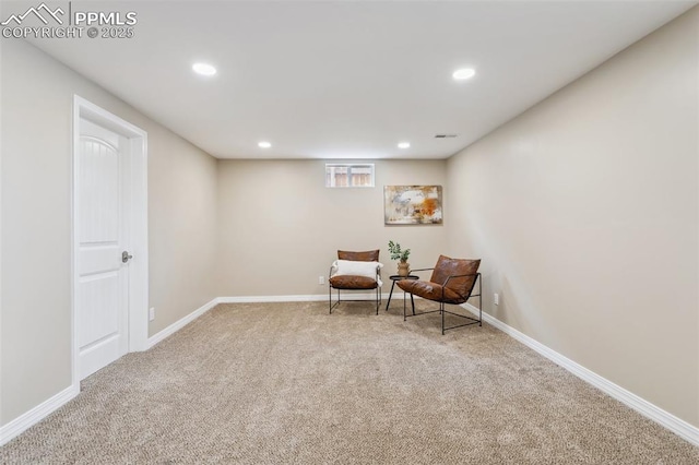 unfurnished room featuring light colored carpet