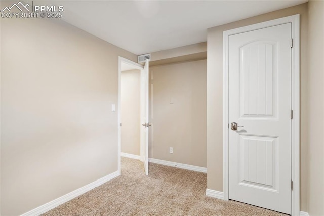 interior space with light colored carpet