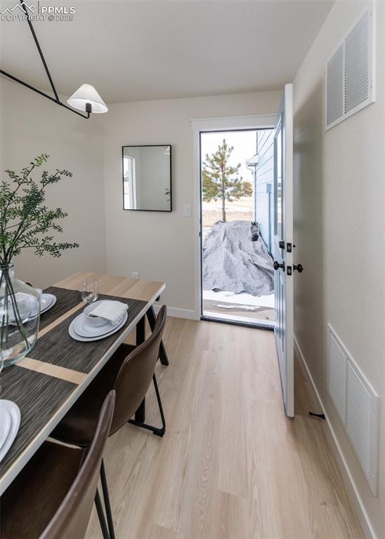 home office with light wood-type flooring