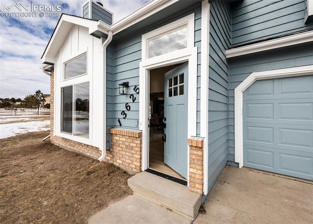 property entrance featuring a garage