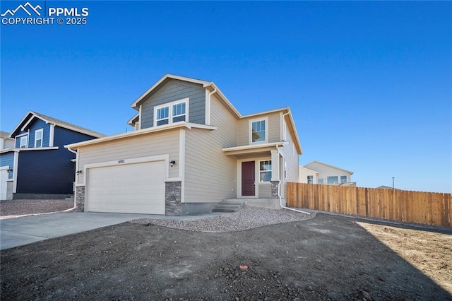 view of front of home with a garage