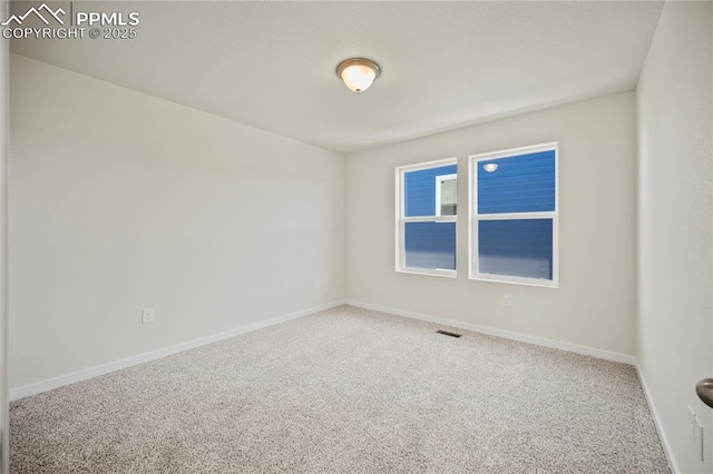 empty room with carpet floors