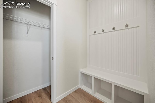 mudroom with hardwood / wood-style floors