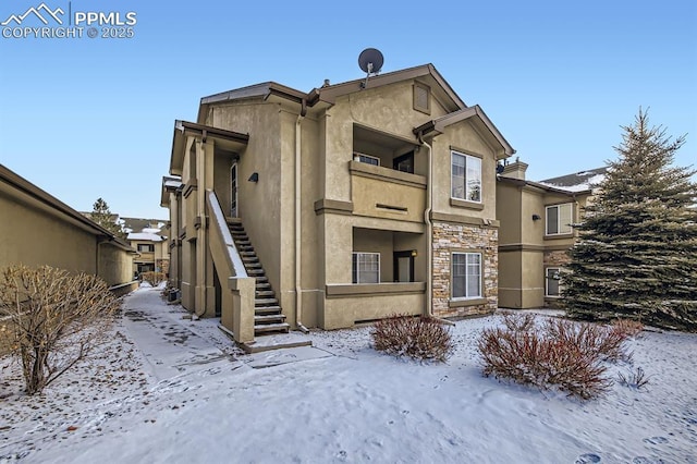 view of snow covered property