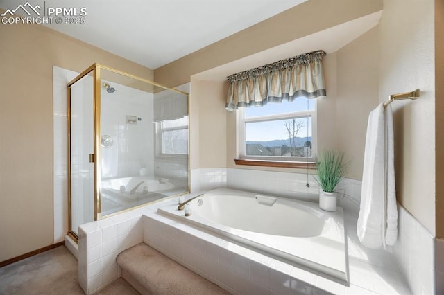 full bathroom with a garden tub and a shower stall