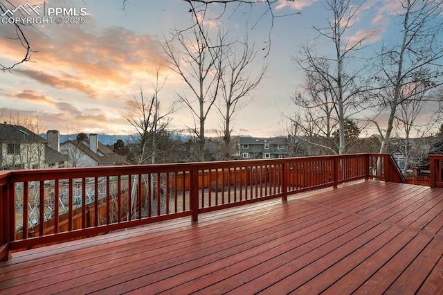 wooden deck featuring a residential view