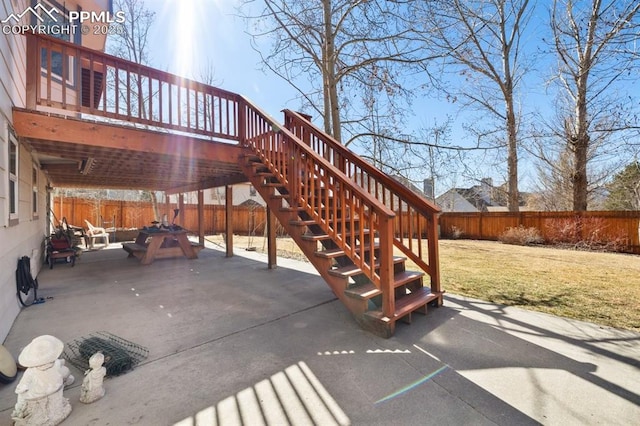 view of patio featuring a fenced backyard and stairs