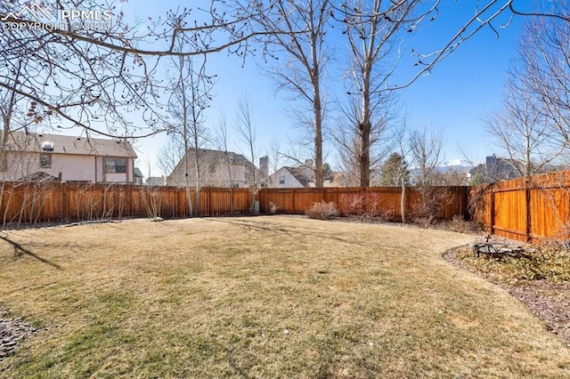 view of yard featuring a fenced backyard