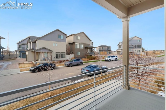 balcony featuring a residential view