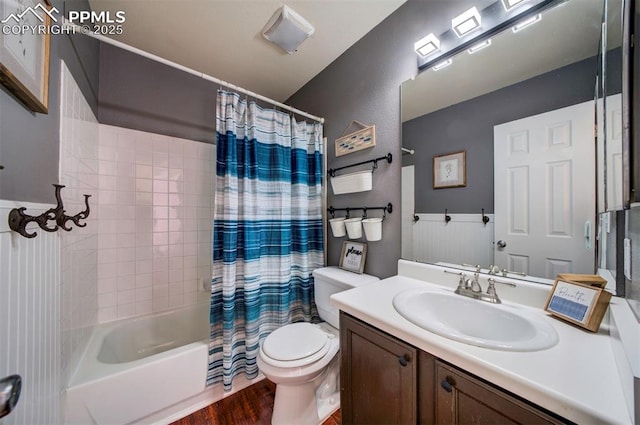 full bathroom featuring vanity, toilet, hardwood / wood-style floors, and shower / bath combo