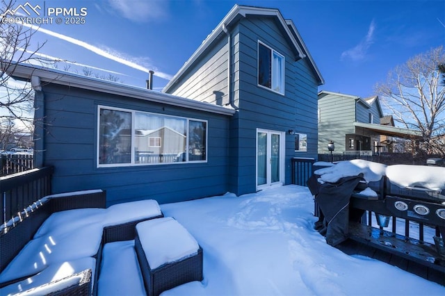 view of snow covered property