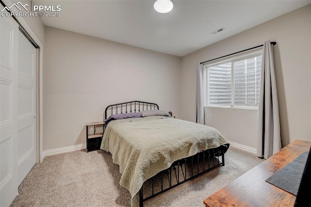 bedroom with light carpet