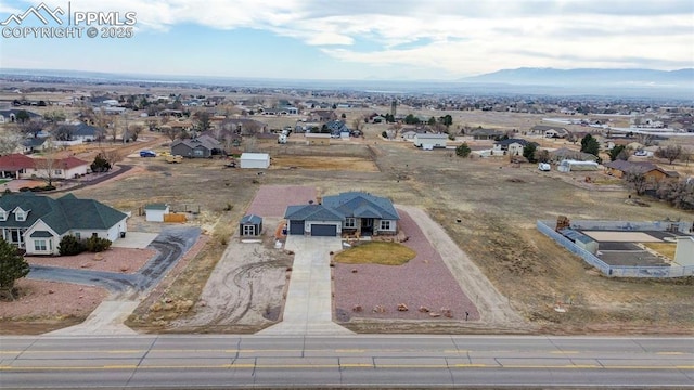 bird's eye view with a mountain view