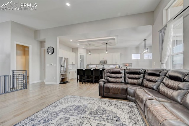 living room with light hardwood / wood-style floors